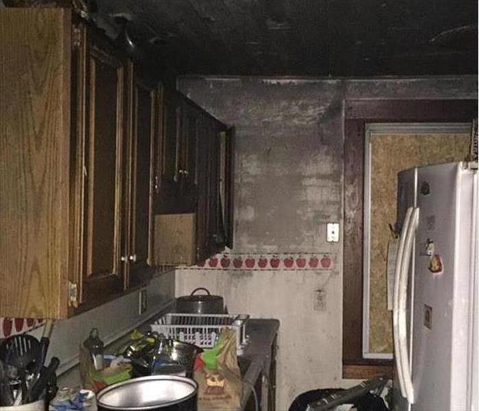 soot and fired damaged kitchen area
