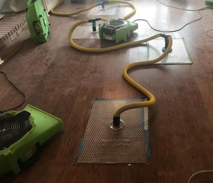 SERVPRO drying equipment on flood damaged floor